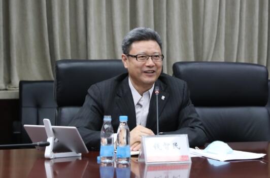 錢智民拜訪中國(guó)建材黨委書記、董事長(zhǎng)周育先