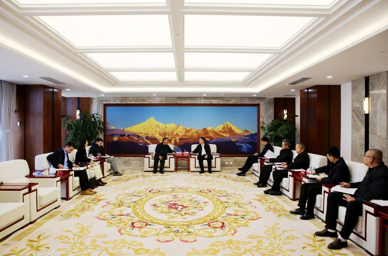 王繼才與昆明市發(fā)改委副主任、市能源局局長施云懷會談