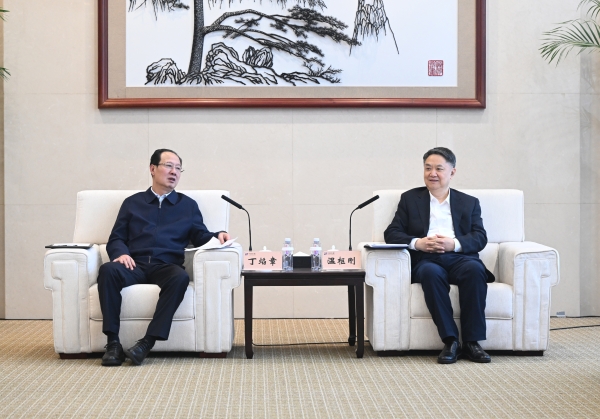 丁焰章與中國華能董事長、黨組書記溫樞剛會談